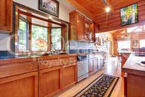 Large kitchen lof cabin house interior.
