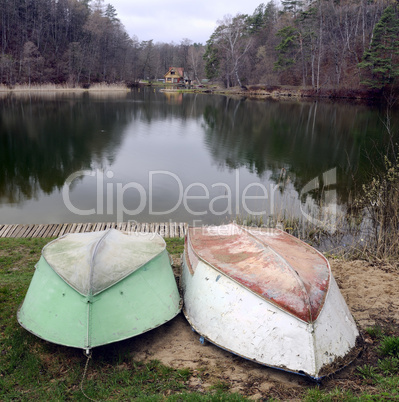 Two boats on a lake coast Two boats on a lake coast