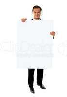 Business executive promoting big blank banner ad