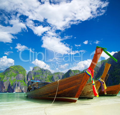 beach, longtail boats,