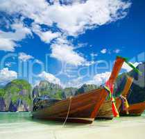 beach, longtail boats,