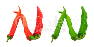 Letter N composed of green and red chili peppers