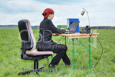 Businesswoman working in the free