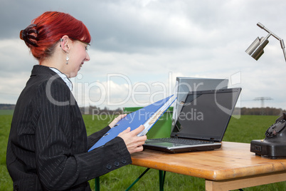 Businesswoman working in the free