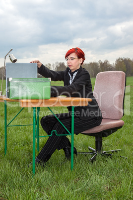 Businesswoman working in the free