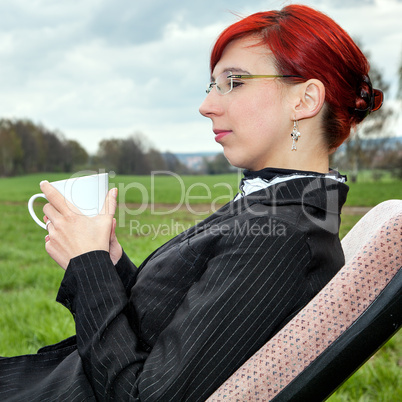 Businesswoman working in free and takes a break