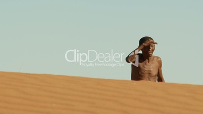 Kalahari bushman appearing over blind horizon