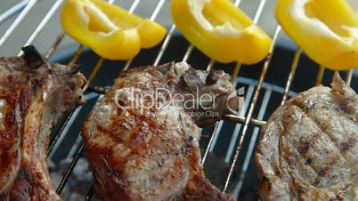Pork Steaks On Barbecue Grill