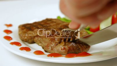 Eating Grilled Steak