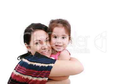 beautiful young mother and her two year old daughter looking at