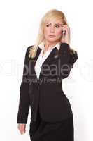 Blonde businesswoman chatting on her mobile