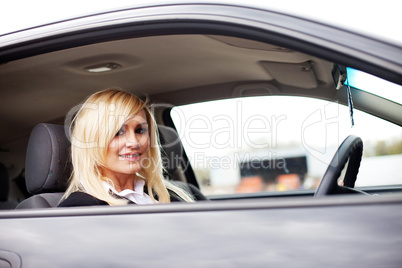 Attractive blonde behind the wheel
