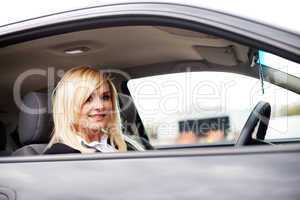 Attractive blonde behind the wheel