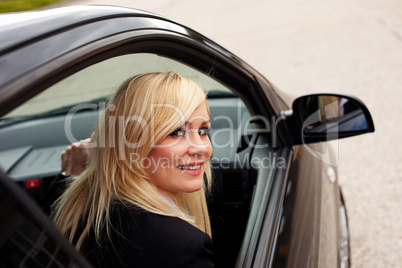 Attractive blonde female driver
