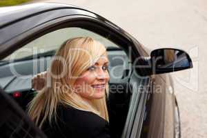 Attractive blonde female driver