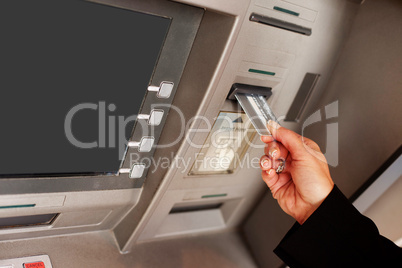 Woman using an ATM