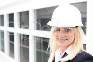 Portrait of woman with construction helmet