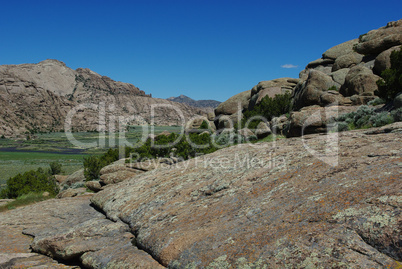 Rocks and green River valley at Split Rock, Wyoming