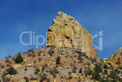 Rock wall and boulders near Wolverine Petrified Wood Area, Utah