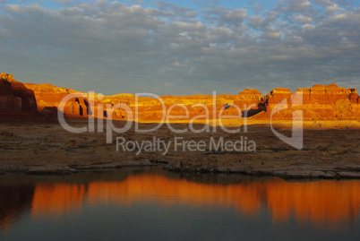 Sunset reflection of red rocks on Colorado River, Utah