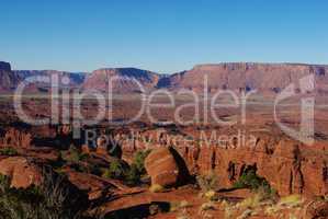 Rocks near Fisher Towers with Colorado River in the distance, Utah