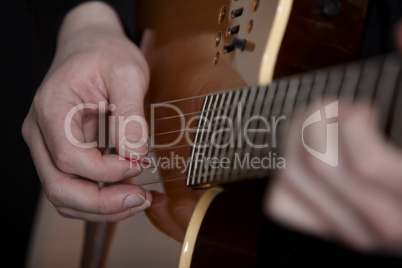 Guitarplayer on black