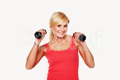 Fit woman lifting dumbbells