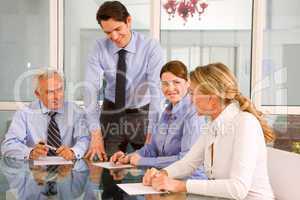 businessmen and businesswomen during a working meeting