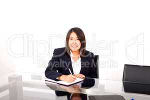 asian businesswoman writing