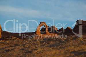 Delicate Arch in first morning light from a distance, Arches National Park, Utah