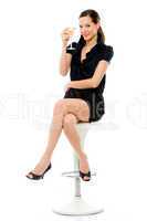 elegant young woman drinking a cocktail on white background stud