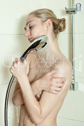 woman is taking a shower and relaxing