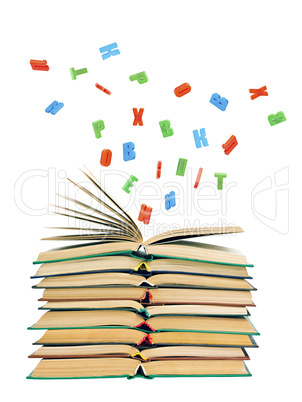 colorful letters flying out of an open book