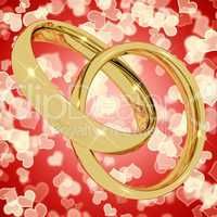 Gold Rings On Heart Bokeh Background Representing Love Valentine