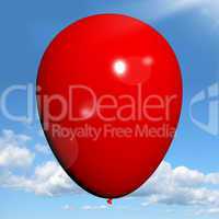 Red Balloon On Sky Background Has Copyspace For Party Invitation