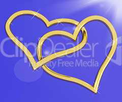 Gold Heart Shaped Rings On Blue Representing Love And Romance