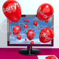 Sorry Balloons From Computer Showing Online Apology Regret Or Re