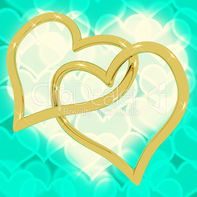 Gold Heart Shaped Rings On Turquoise Bokeh Representing Love And