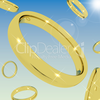 Gold Rings Falling From the Sky Representing Love Engagement Or