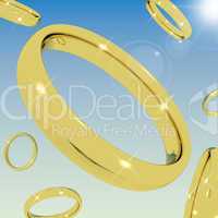 Gold Rings Falling From the Sky Representing Love Engagement Or