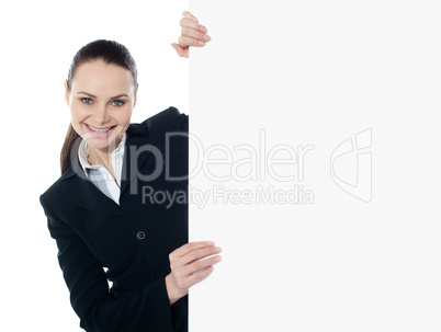 Businesswoman holding a long banner ad