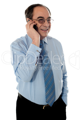 Business professional communicating via phone