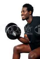 Muscular man with dumbbell