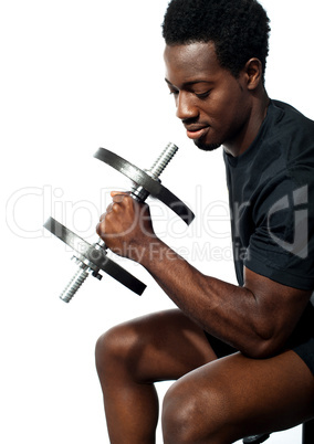 Confident young man working out