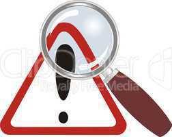 warning sign under magnifying glass