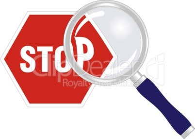 stop sign under magnifying glass