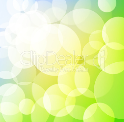 Green spring background with blurry light