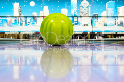 Sphere ball standing on bowling lane