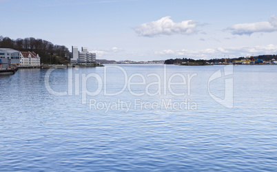 coastline with town and harbor in norway