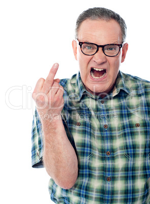 Image of a displeased man showing middle finger